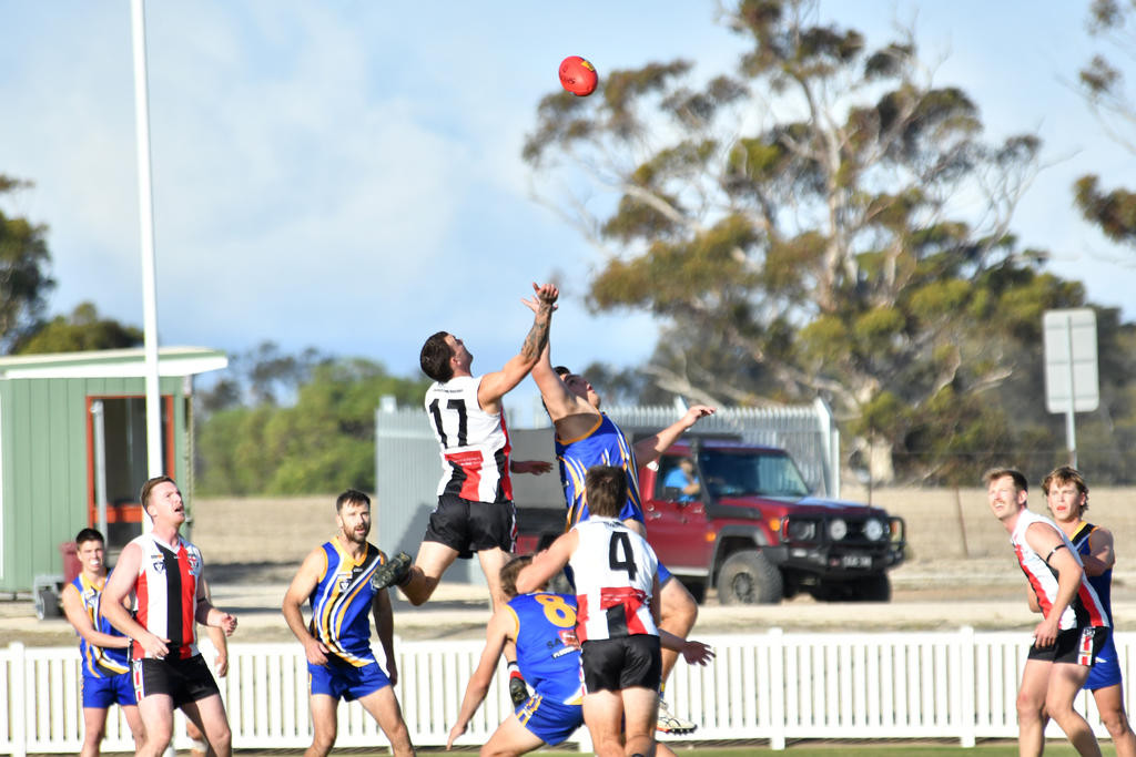 Edenhope Apsley's Angus Wood rises for the ball.