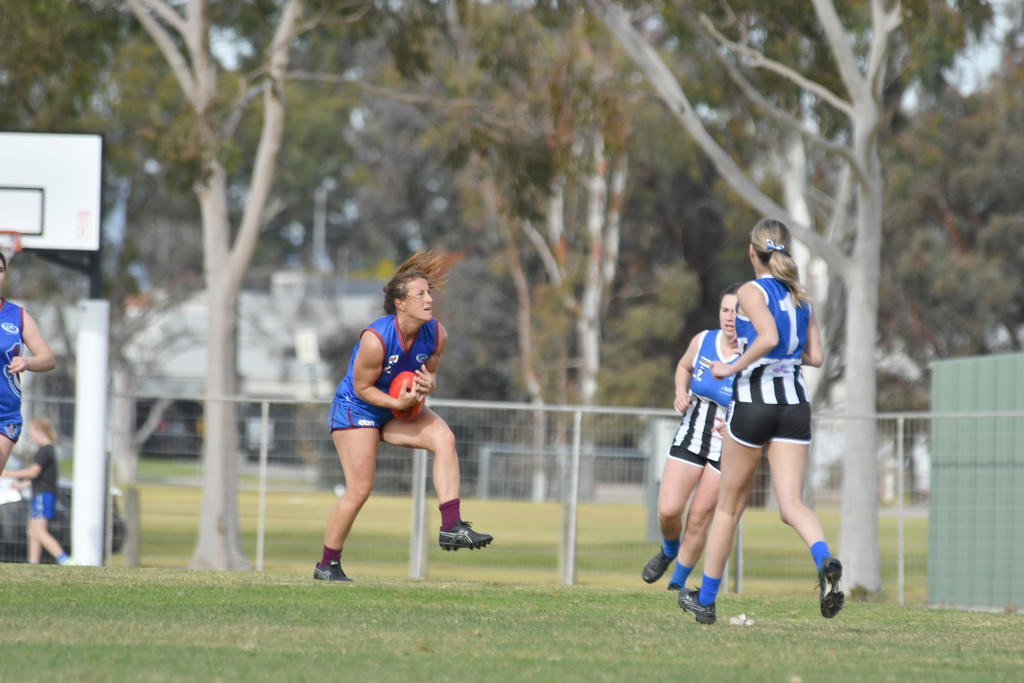 Horsham's Kim Parker takes a mark.