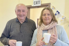 Graeme Smith and guest speaker Caroline Cocks are enjoying a cup of tea at the event.