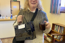 Lucky door prize winner Lynne McKenzie pictured with the gift hamper.