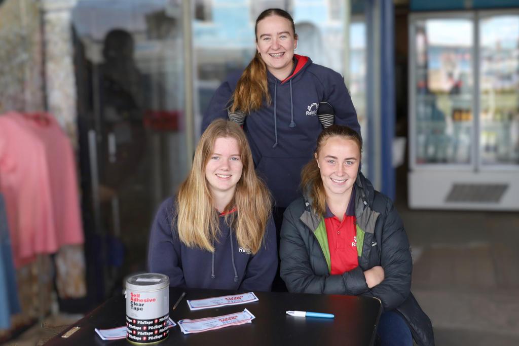 P-12 College students Amelie, Sally and Jayde were selling raffle tickets outside the Rainbow News Agency for their snow trip to Mount Buller in August this year.
