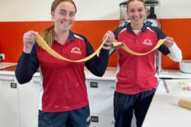 Jayde and Addison are delighted after making the pasta.