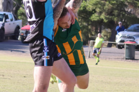 Southern Mallee Thunder’s Angus McSweyn strong spoils the ball.