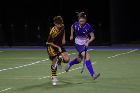 Warrack’s Sam Williamson controls the ball under pressure from Kaniva’s Imogen Williams.