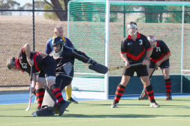 Some scrambly, but effective defence by the Horsham Hurricanes during the only penalty corner they had to face in the match against the Nhill Rangers.