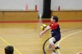 James Johns digs the ball.