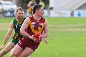 Dylan Watts takes possession on the ball during the Warrack Eagles’ round eight clash against Dimboola.