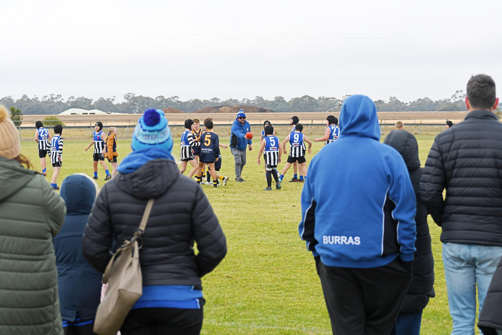 Parents braved the cold to watch the under-11 footballers take the field in single digital temperatures.
