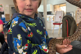 Nathan holding Lisa the Stimson Python.