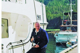 Shoe-Man Extraordinaire - Peter Sheppard OAM with another of his passions, boating.