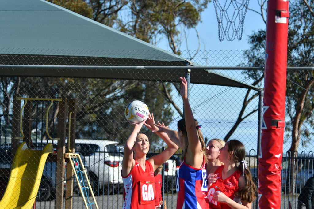 Taylors Lake's Harriet Overman prepares to shoot while being defended by Kalkee's Lotus Martin.