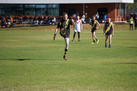 Callum Barnes kicks long into the Wimmera Whippets forward line.
