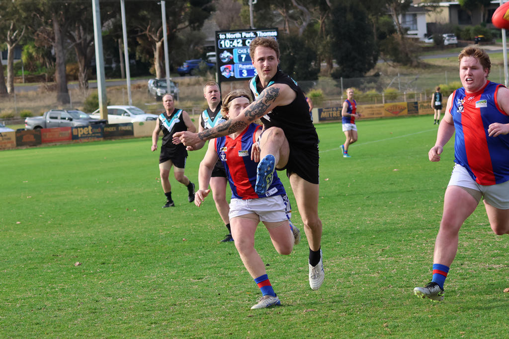 Jordon Motton kicks away for Swifts against Rupanyup