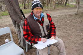 Mick Pursell keeping score at the NF&G Charity Day for MND