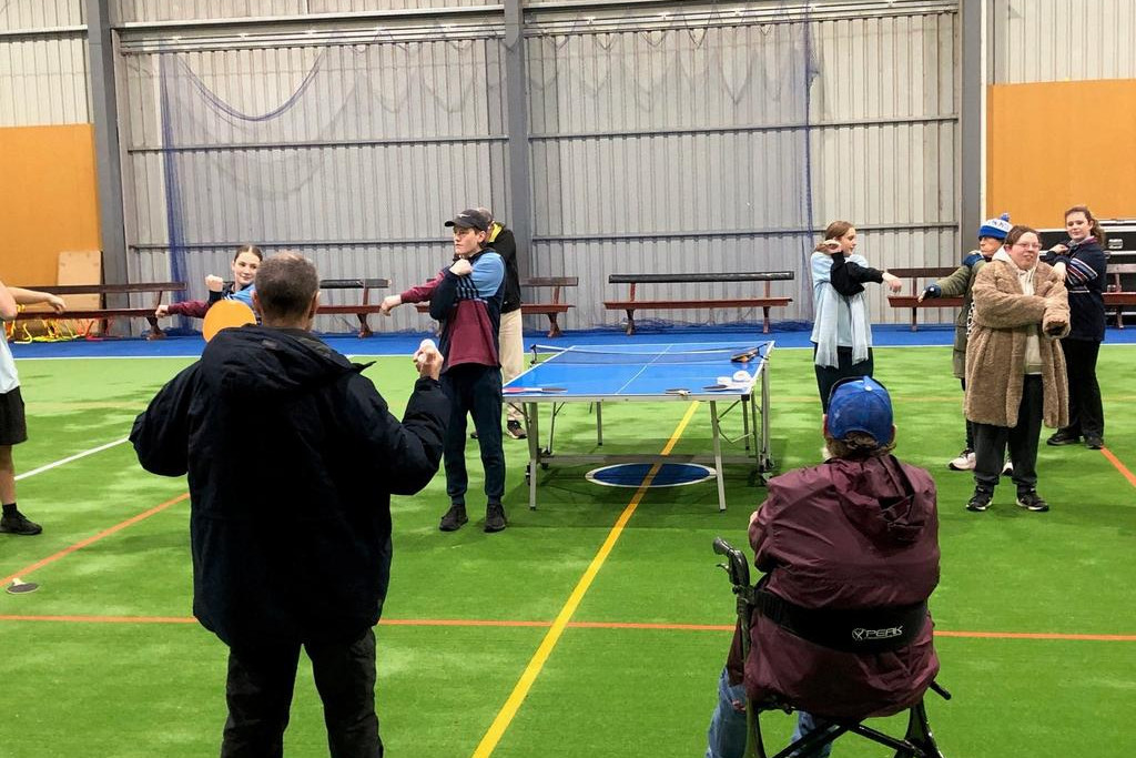 Donald High School student Judd Geddes (centre) leads the warmup drills before the games start.
