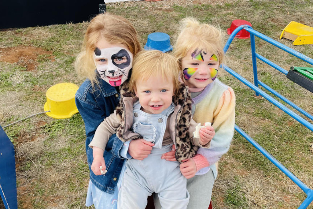 Matilda, Mia, and Eliza Gormann enjoyed the face painting at the Mallee Machinery Field Days. Photo: SHERYL LOWE