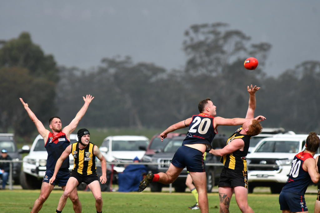 Laharum's Ryan Thomas and Pimpinio's Mackay Baker contest the ruck in Sunday's semi-final.