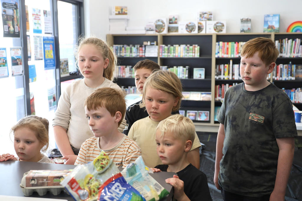 Twelve local kids attended the Cooking with Sharon activity at the Rainbow Library.