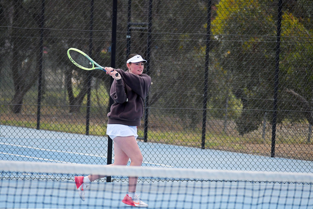 St Michaels Violet McGennisken unleashes a backhand during her side's contest against Kalkee in round six of the 2025-26 Central Wimmera Tennis Association's pennat competition.