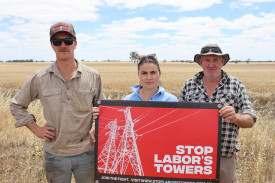 Cooper Reading (6th generation farmer) Liana Decarli and 5th generation farmer Phil Reading stand in front of their paddock that is in the path of the VNI-West Transmission Line.