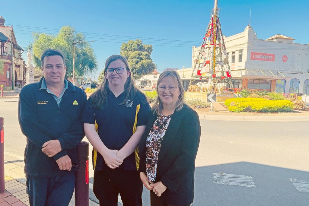 Warracknabeal Secondary College student Benjamin Holland (middle) has capped off a remarkable journey to be named 2025 dux, turning early challenges into academic success with the support of family, teachers and a better understanding of himself. Benjamin is pictured with proud parents David and Fiona.