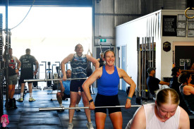 HCF CrossFit members go through a workout.