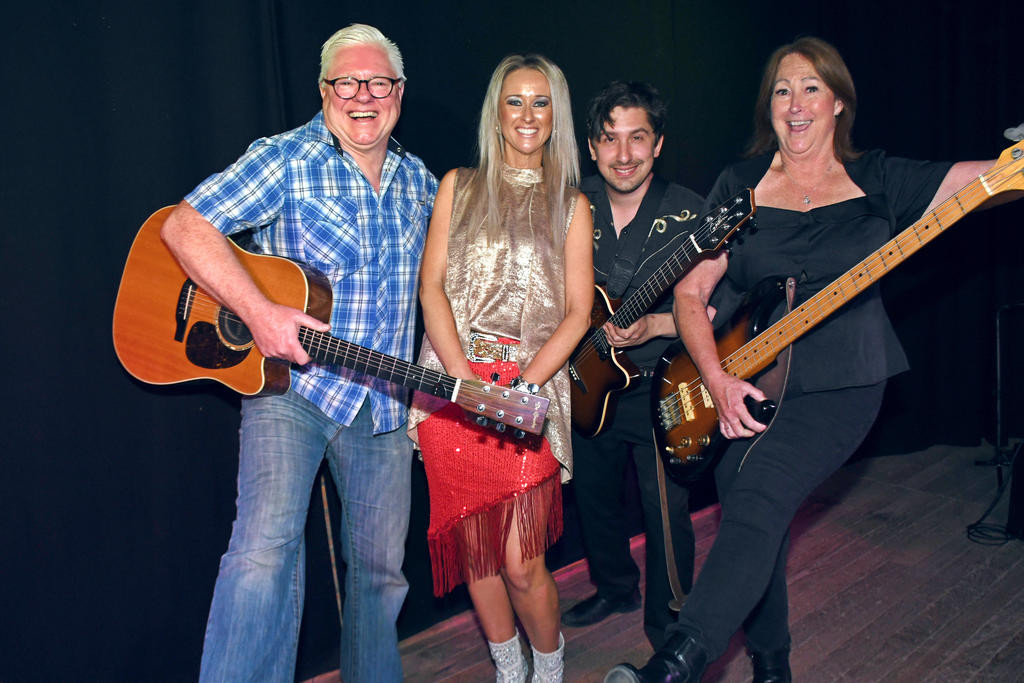Alana Morrow with the Danny Stain tribute band members after a sell-out concert in the Warracknabeal Town Hall. Alana owns AlanaM Productions and regularly brings artists to Warracknabeal and the surrounding district for music events. (Alana and Danny Centre).