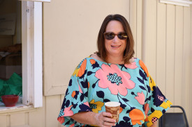 BEAUTIFUL DAY: Sharyn Cocks enjoying a coffee in the sun. Photo: LES GRAETZ