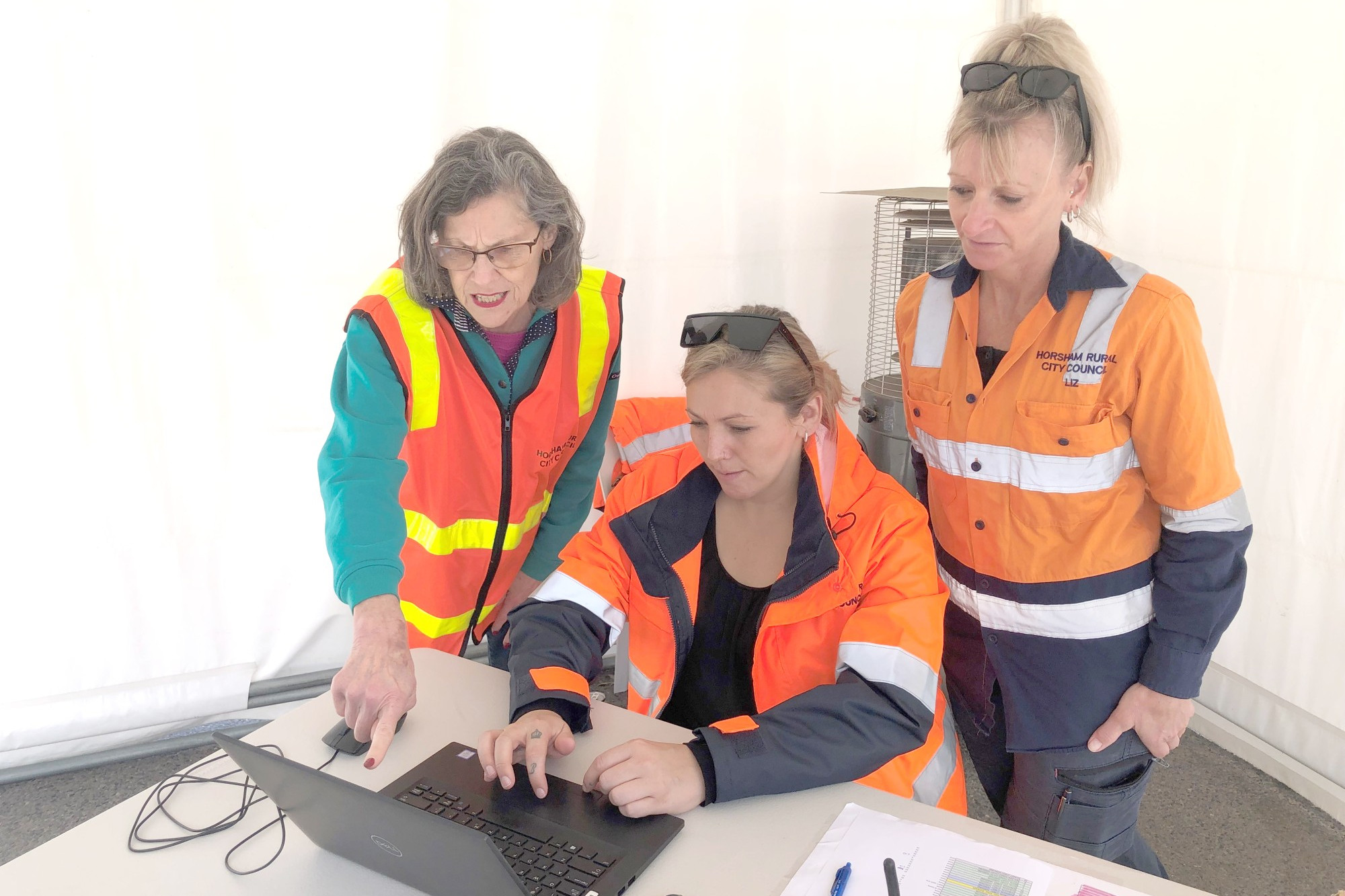 Horsham Mayor Robyn Gulline, Mel Bottoms and Liz Reddie organise sandbags. Picture: HRCC