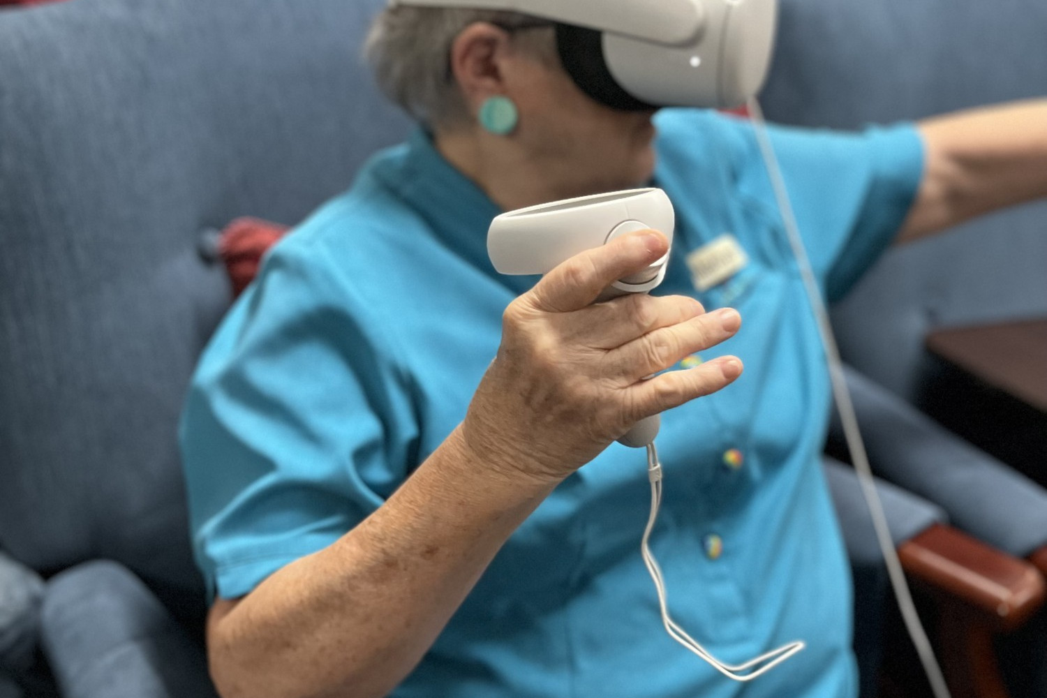 Staff member Marilyn tests out the new VR goggles at Yarriambiack Lodge
