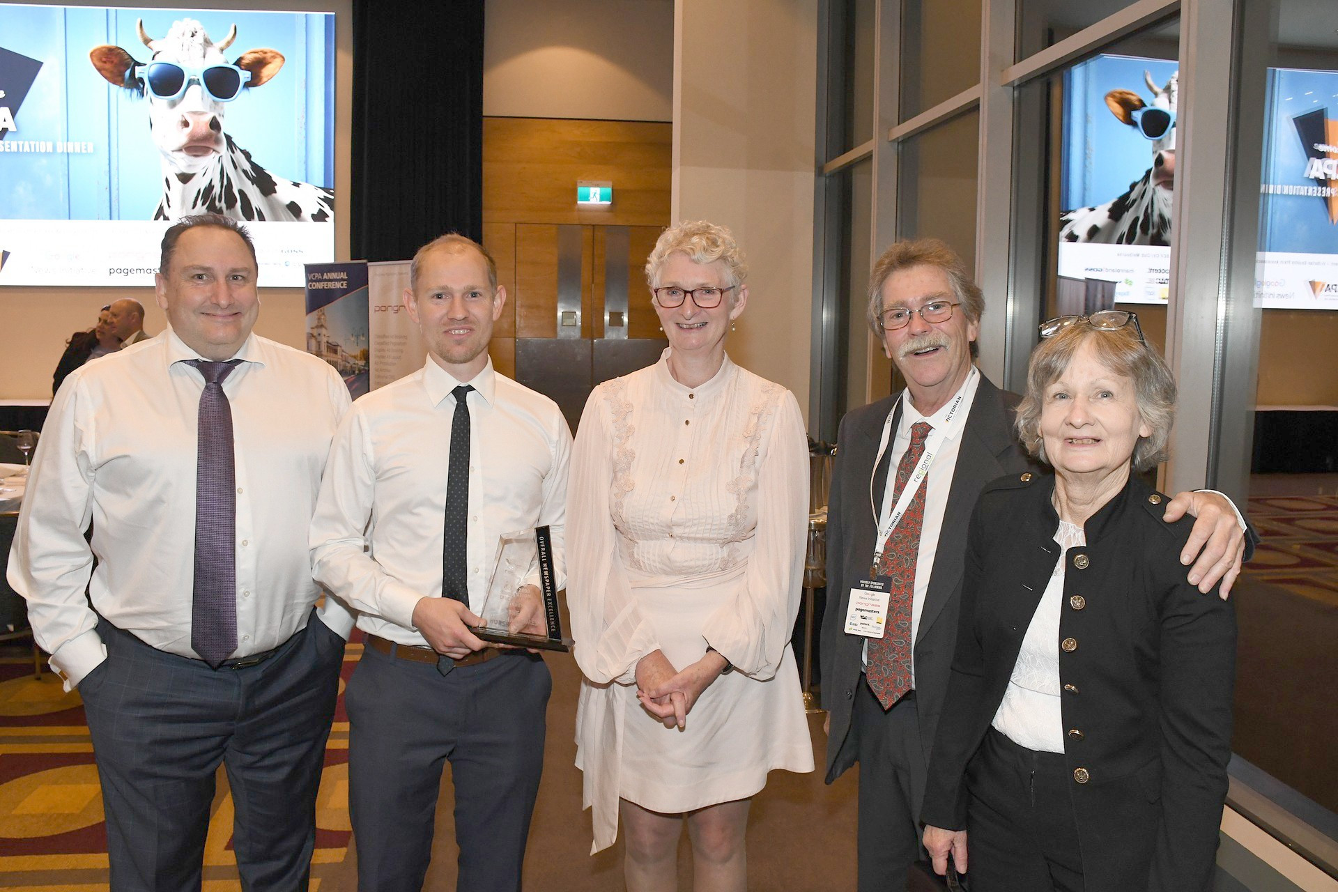 Carolyn Turner, VCPA Judge of Overall Newspaper Excellence (centre), flanked by Wimmera Mallee News owners Lukas White, Andrew Ward, David Ward and wife Jenny.