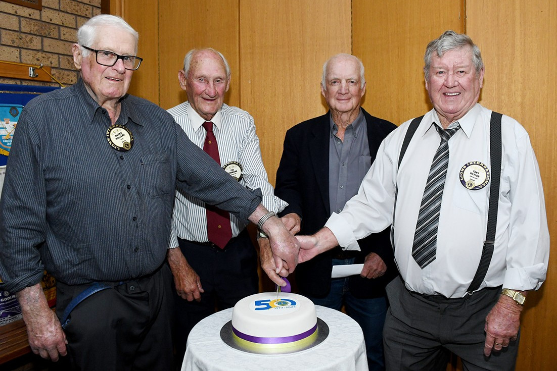 Foundation members: Maurie Williams, Ted Lehmann, Stewart Allen and Tony Naylor jointly cut the 50th anniversary celebratory cake.