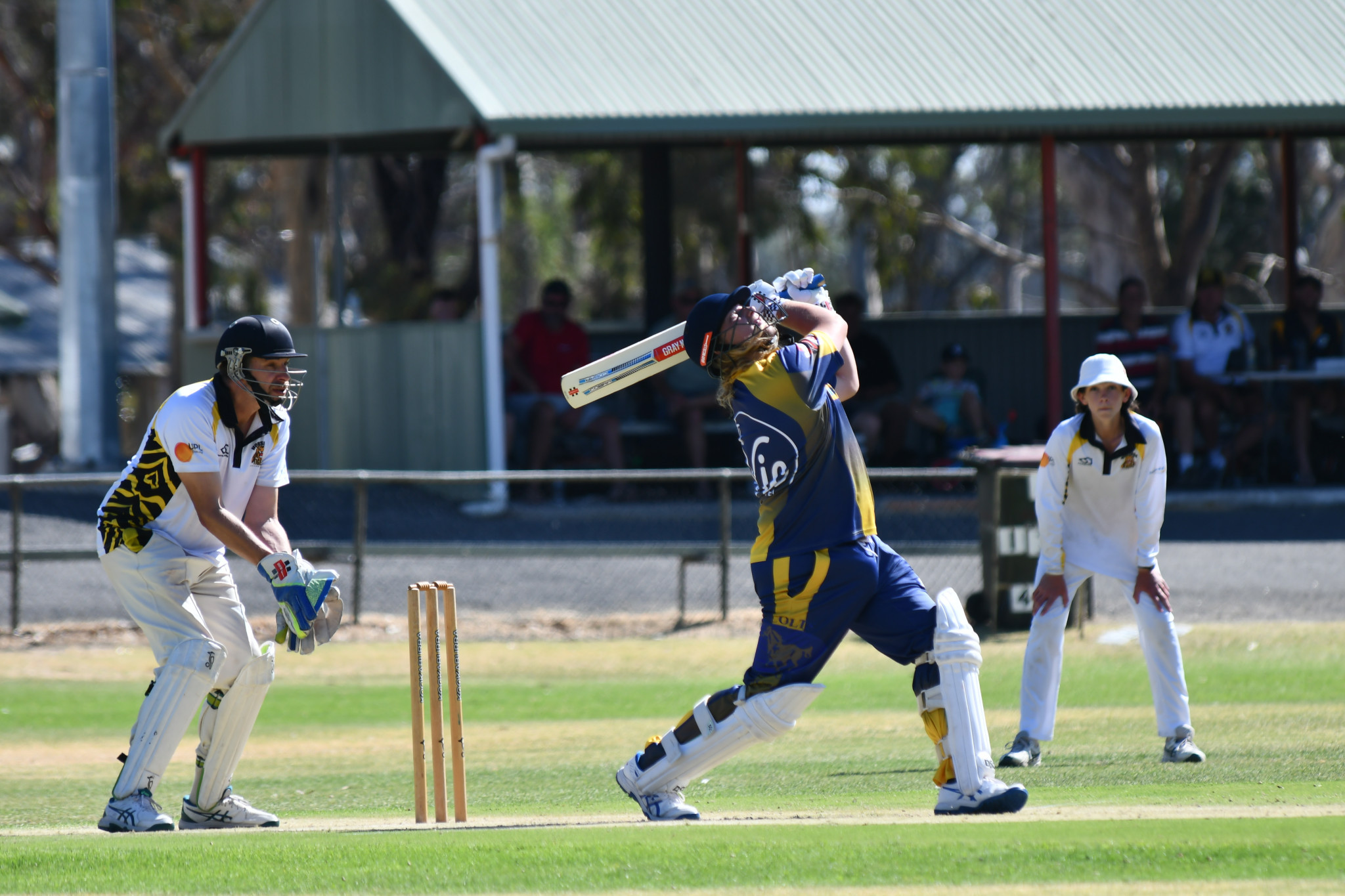 Colts’ Alex Baker hits a high one up in the air, which was caught safely by Scott Marks. PHOTO: CHRIS GRAETZ
