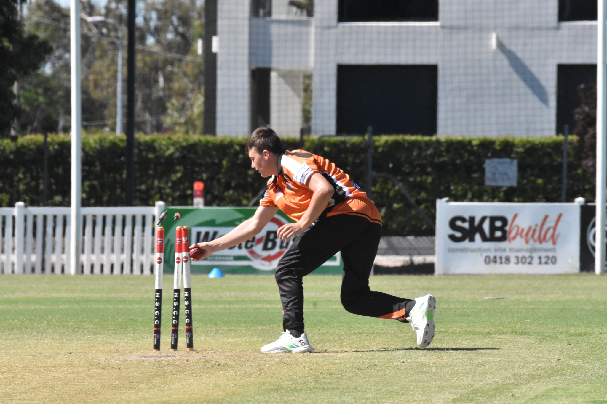 Jackson Moore runs out Hugh Weidemann in their match against Horsham.
