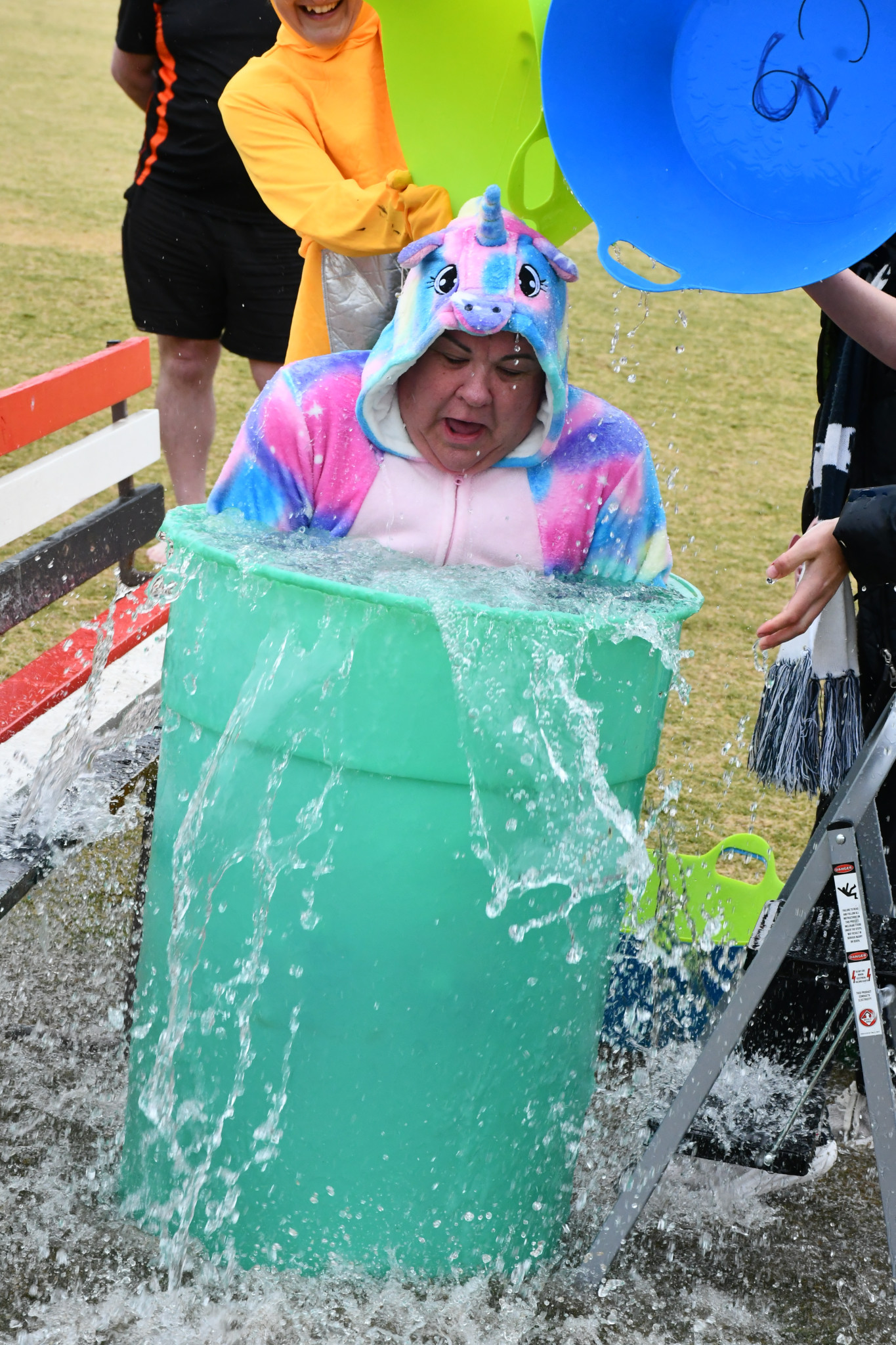 Staff member Lesley Lannen feels frozen in the bucket.