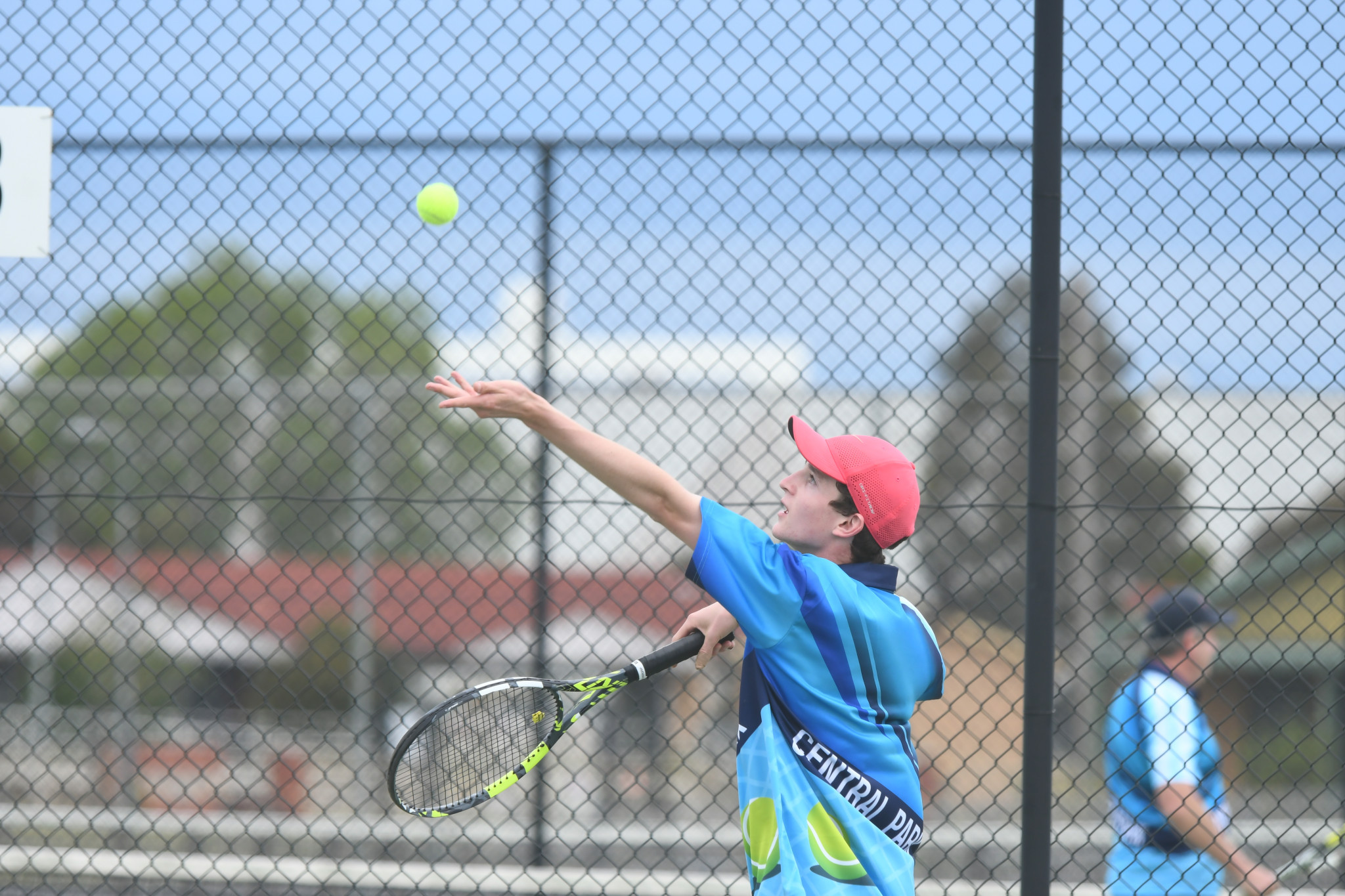 Harry Allan tosses the ball to serve against St Michaels.