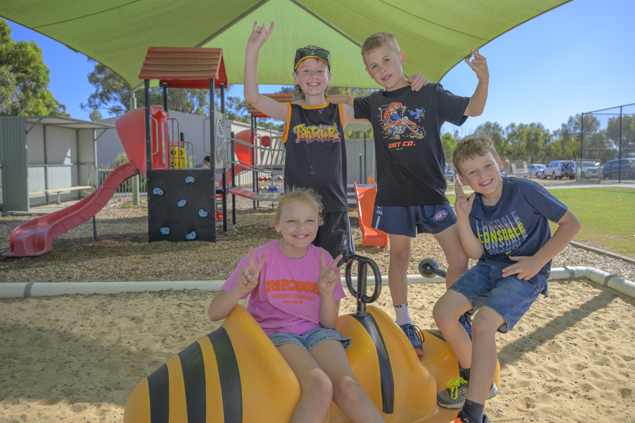 Levi Batchelor and Braxton Schultz (back) have fun with Hayley Walker and Zac Batchelor (front). Photo: ROBIN WEBB
