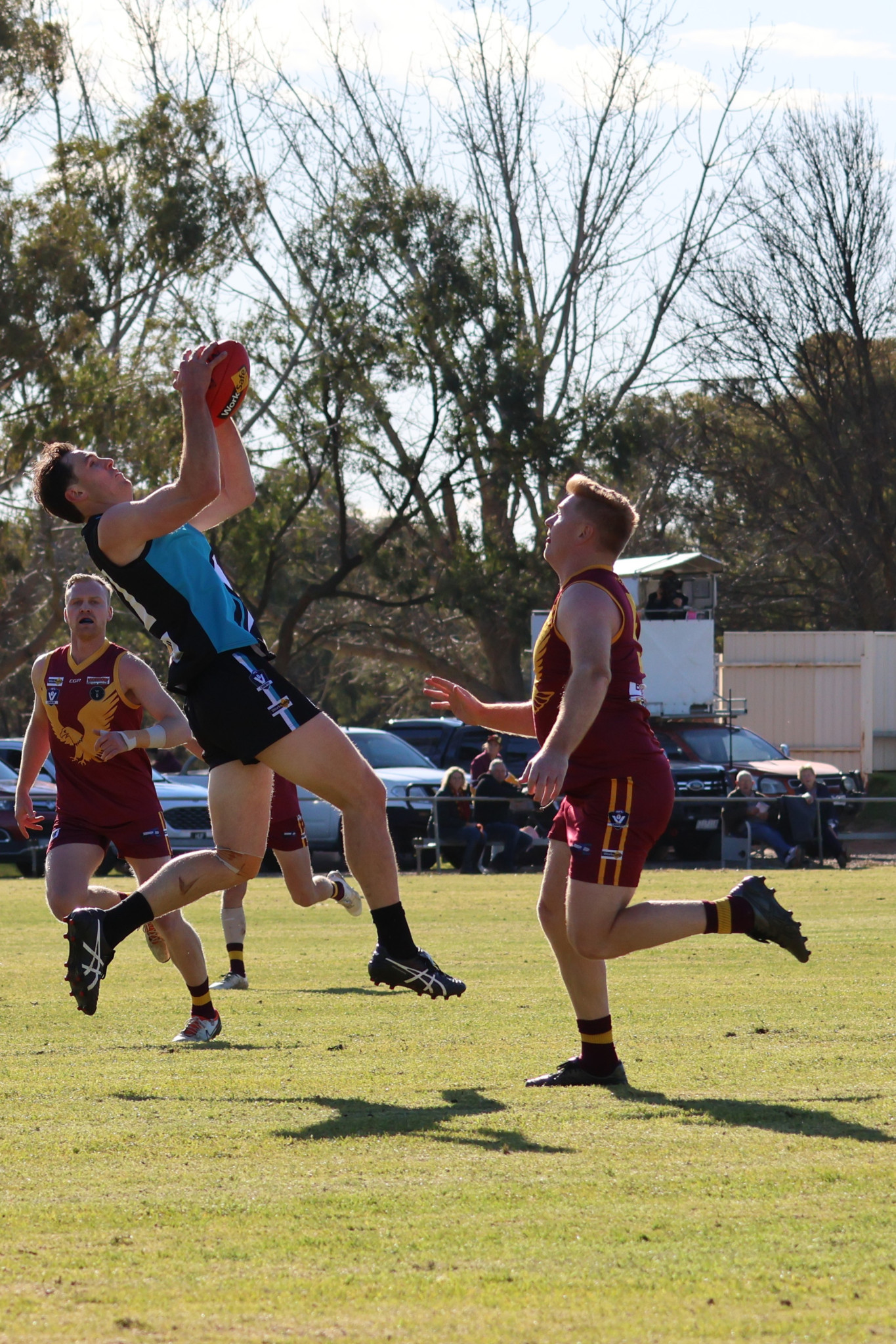 Sam White takes a mark.