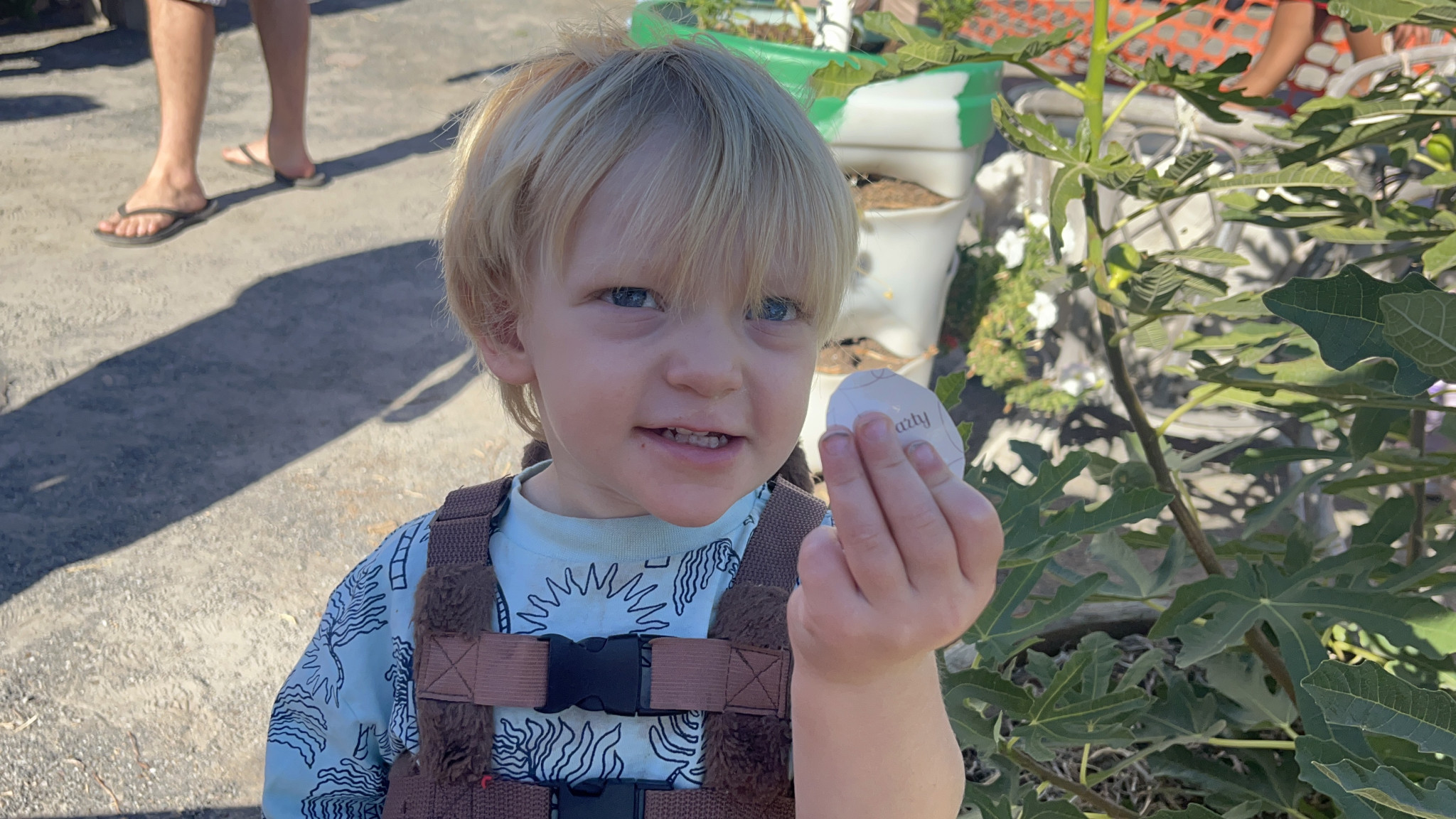 Liam Hay 2 yrs of Horsham finds an easter egg in the Community Garden Easter egg Hunt!