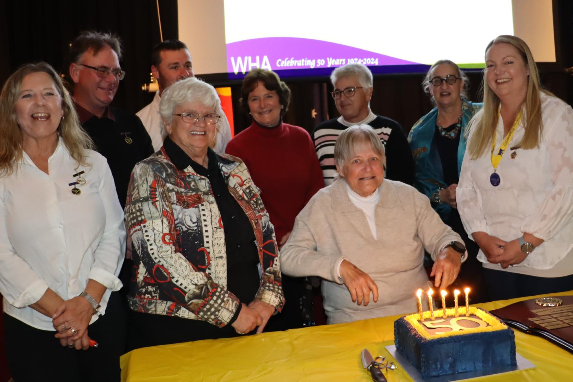 Wimmera Hockey Association life members cut a cake to mark the league's 50th anniversary. Picture by Rachel Clark