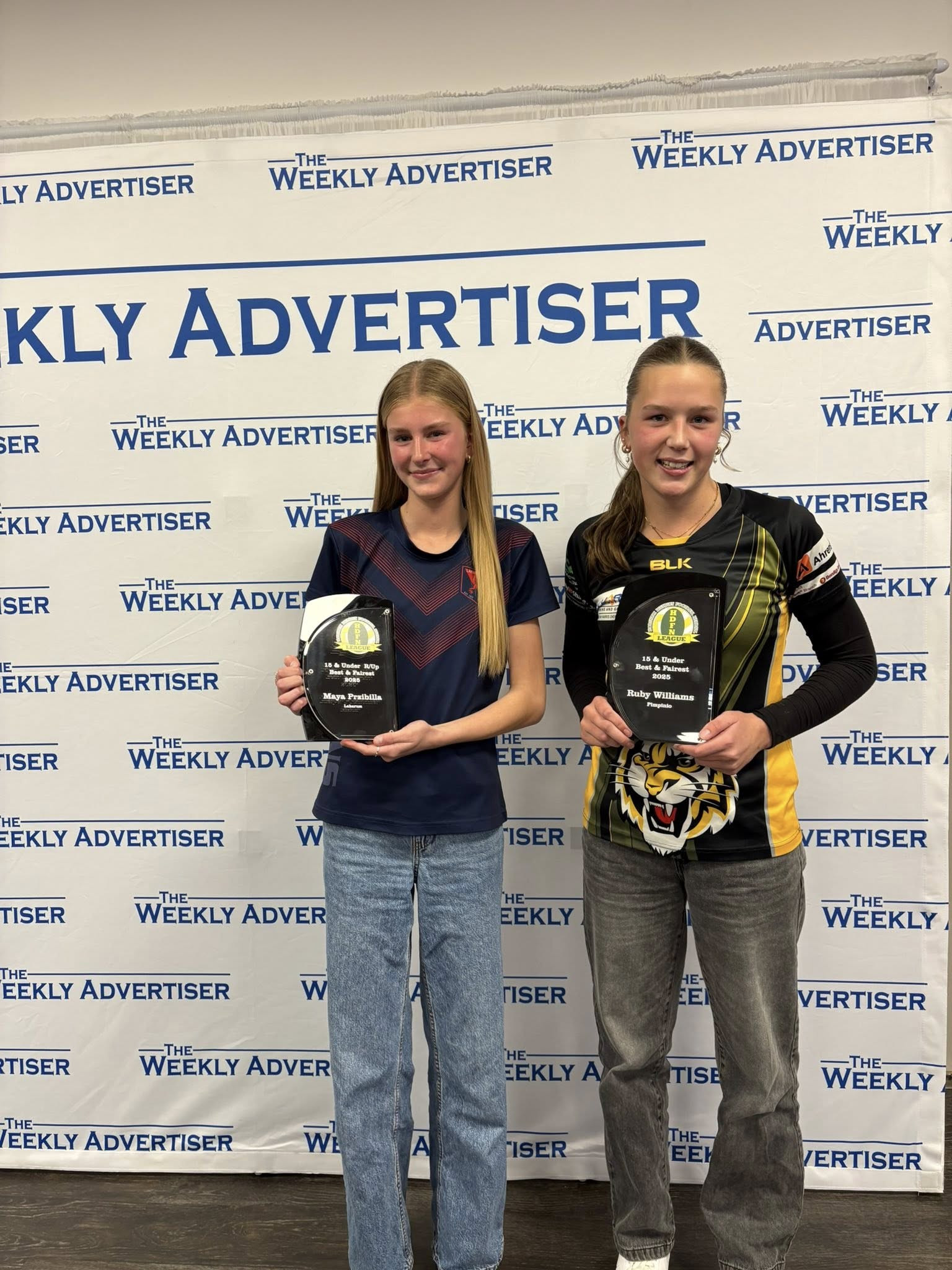 HDFNL under 15s netball best and fairest runner-up Maya Przibilla (Laharum) and winner Ruby Williams (Pimpinio).