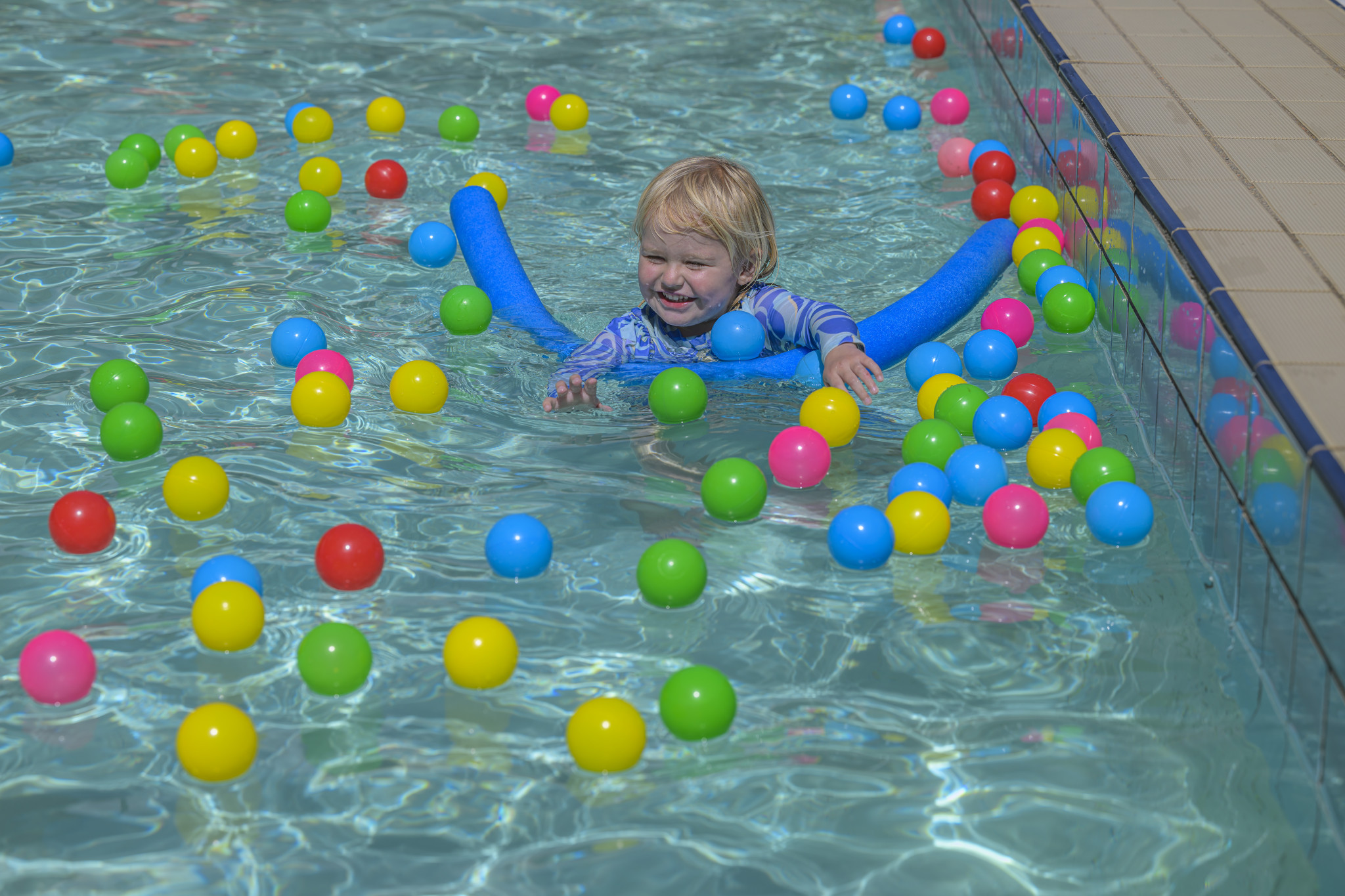 Sunday Looker enjoying her time playing with the coloured balls in the toddlers’ pool. Photo: ROBIN WEBB