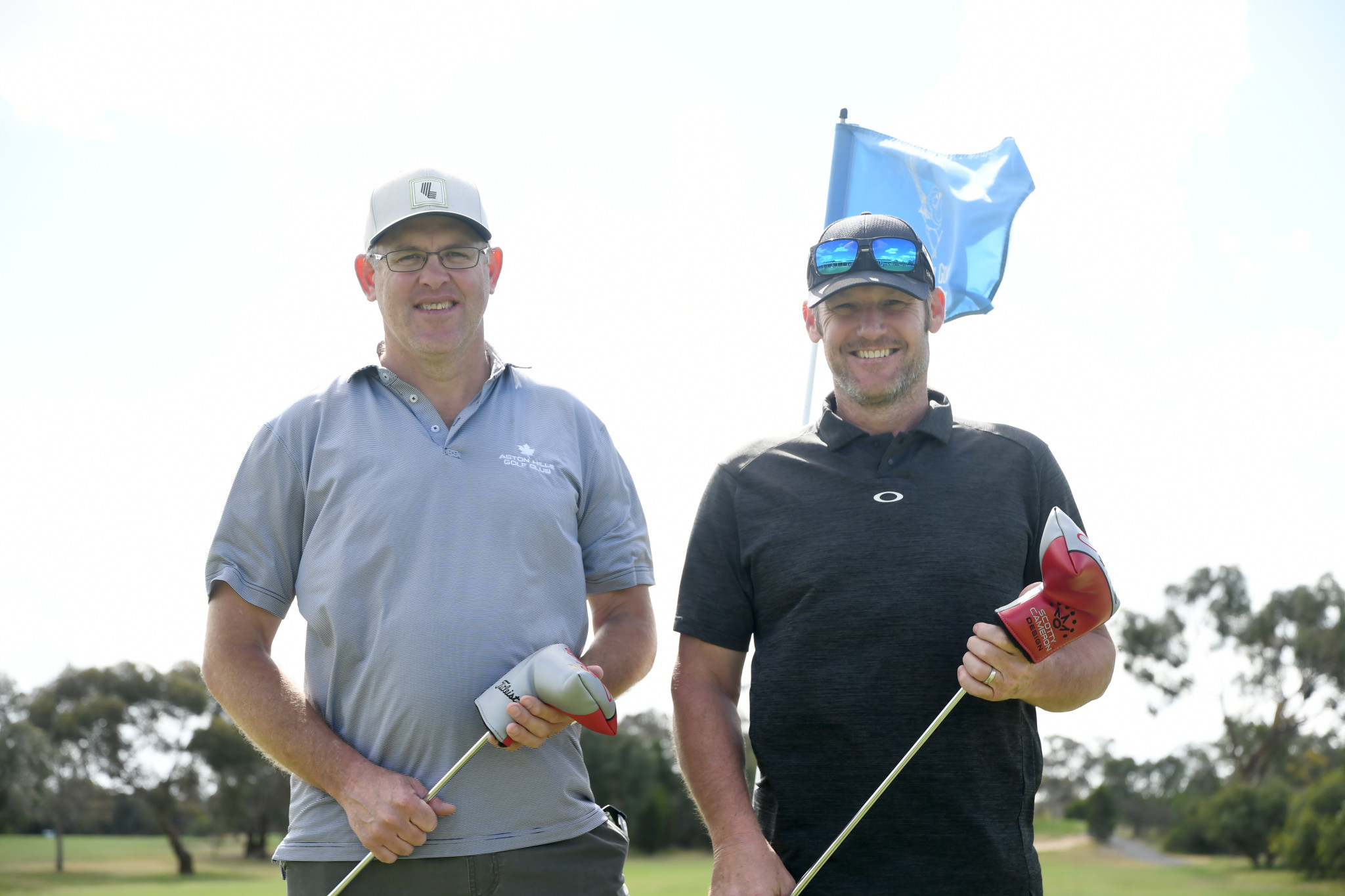 Clayton Shannon and Brendan Lehmann hold their prized putters after taking out the Horsham Golden Putter Tournament, played on October 25-26.