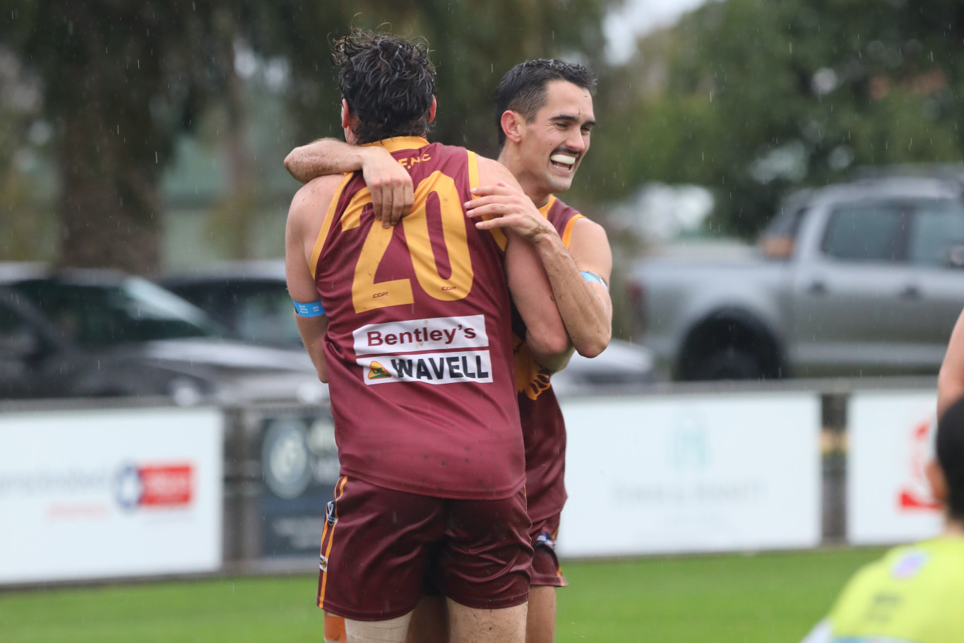 Brandon Walsh and Lachie Stewart celebrate a goal.