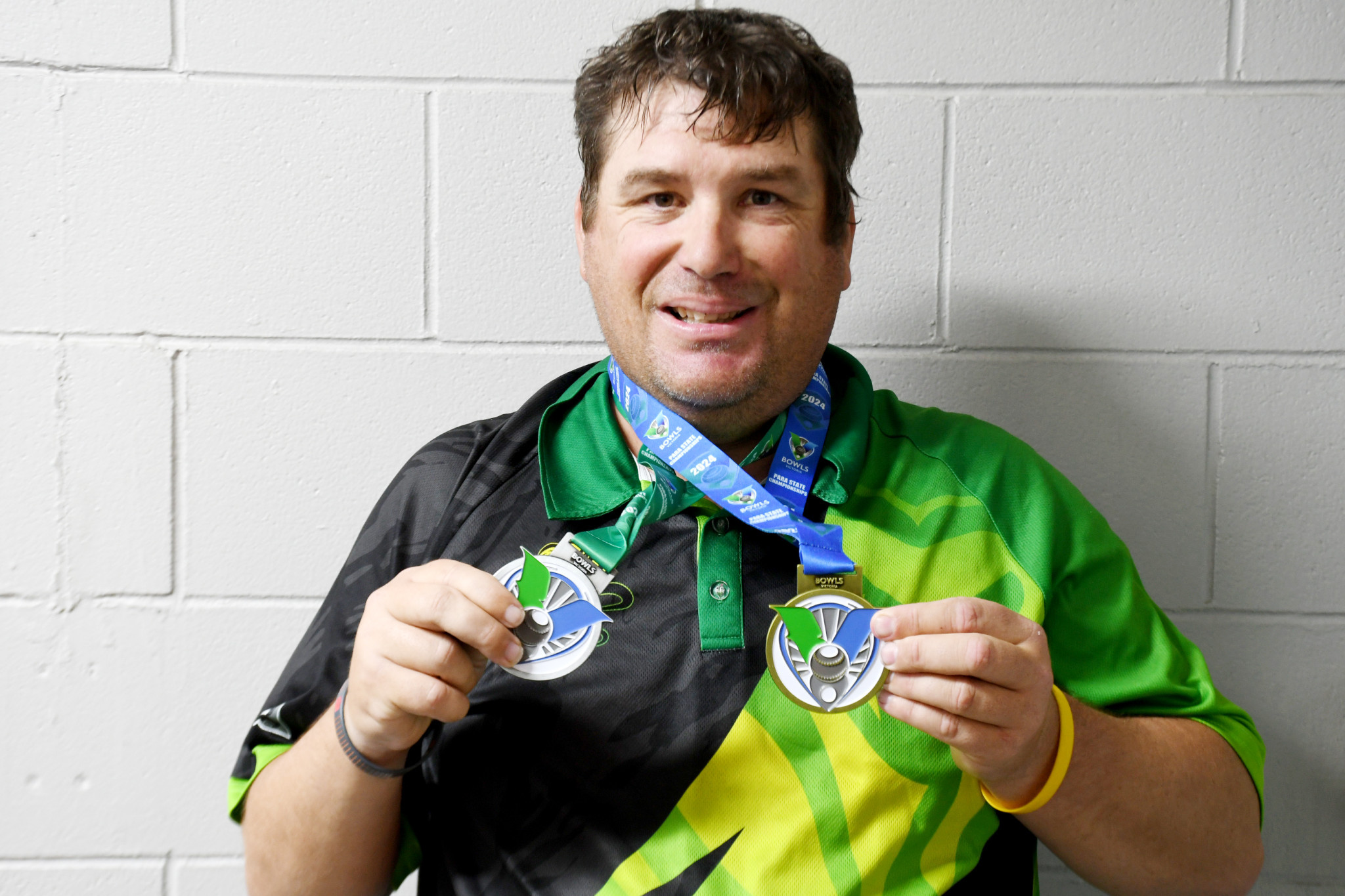 A proud Josh Barry showing off his medals. PHOTO: CHRIS GRAETZ