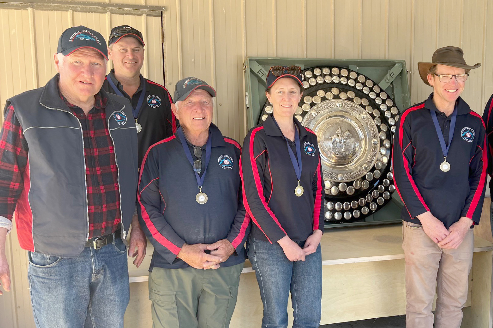 Birchip Rifle Team in front of the 123-year-old Skene Shield: L to R: Team coach Ron Harrison, shooters Ashley Lamour, Lindsay Blythman, Karina Bailey, Nic Harrison, David Lee and Jodie Lamour. PHOTO: SUPPLIED