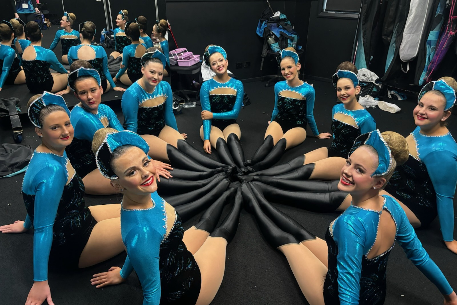 The girls get ready to take to the stage for their March routine.