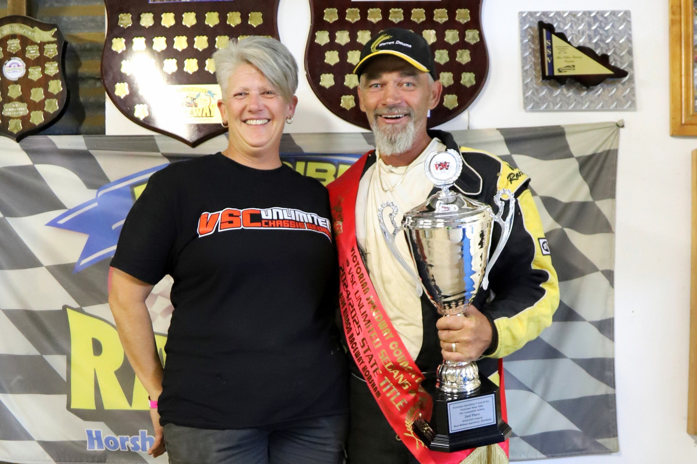 Danny Smith with wife Sue on the podium after the race. PHOTO: TANYA EASTWOOD