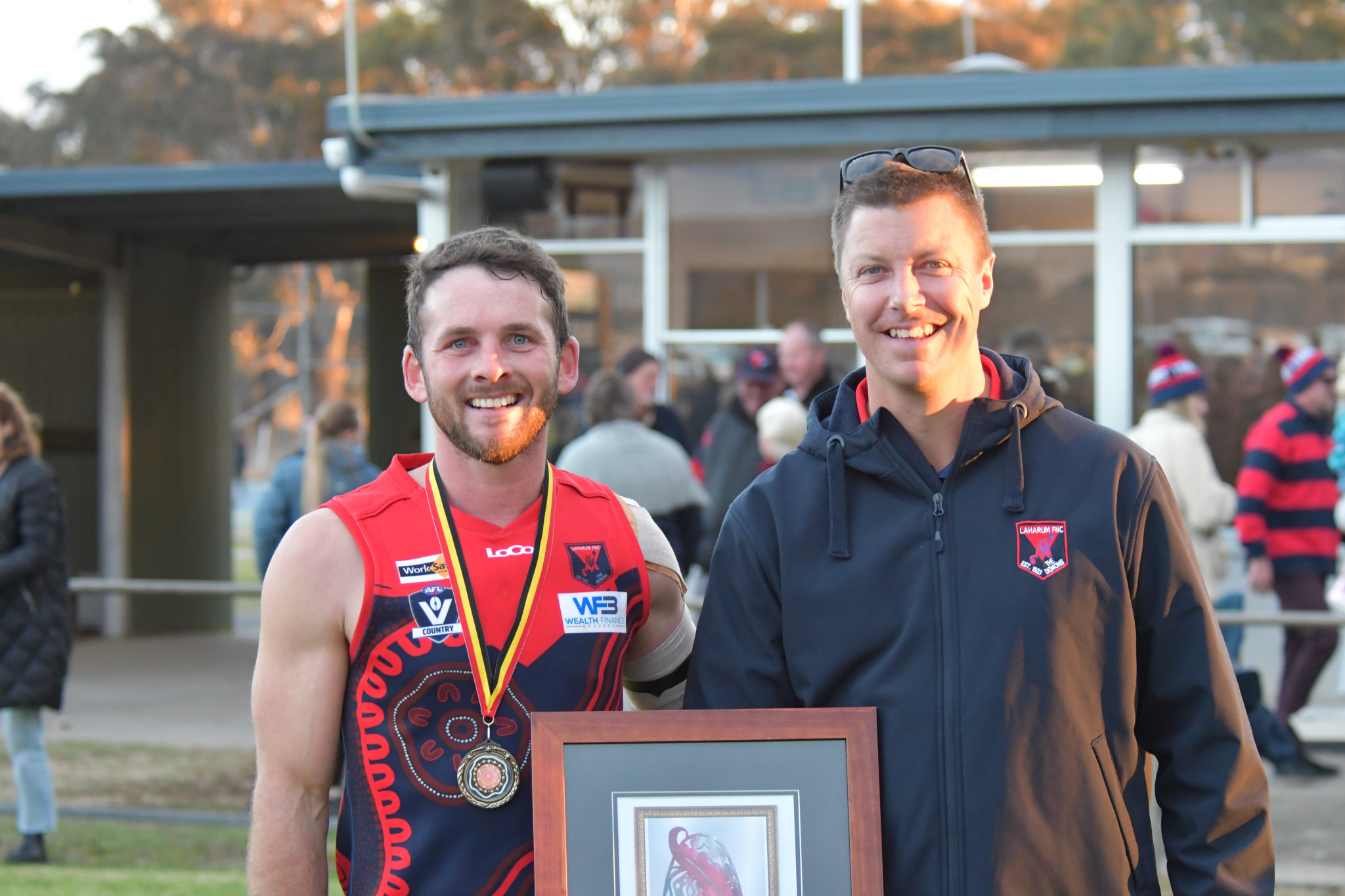 Senior co-coach Robbie Miller (left) with president Hamish Roberts. Miller won the best on the ground medal. PHOTO: TONY TOMLINS