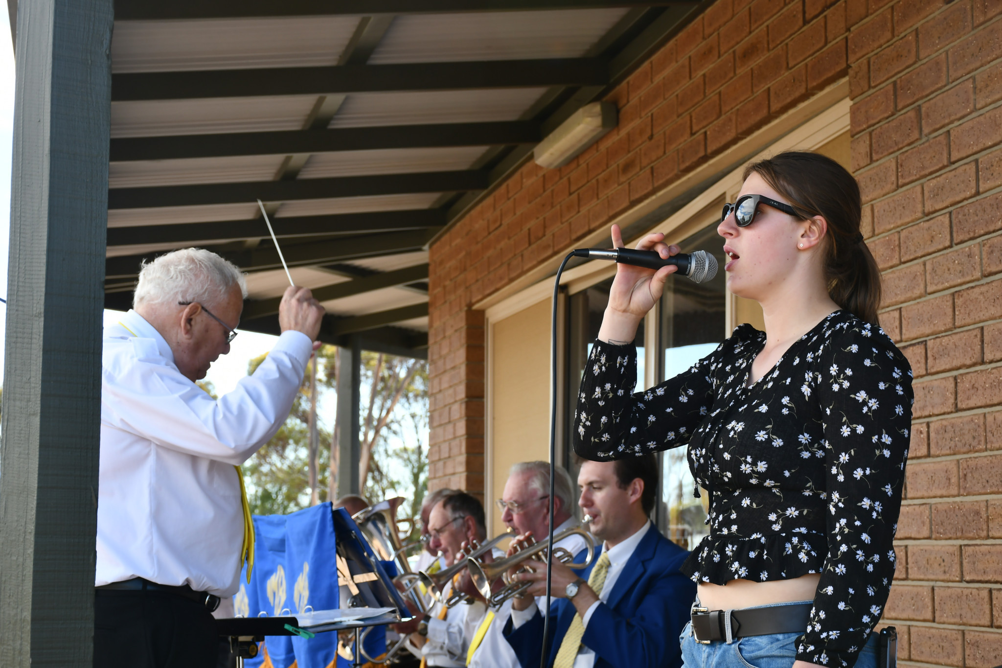 Local musician Emilee Jones-Pritchard sang the national anthem, accompanied by the Natimuk Brass Band at the Australia Day ceremony. Photo: TAYYAAB MASROOR